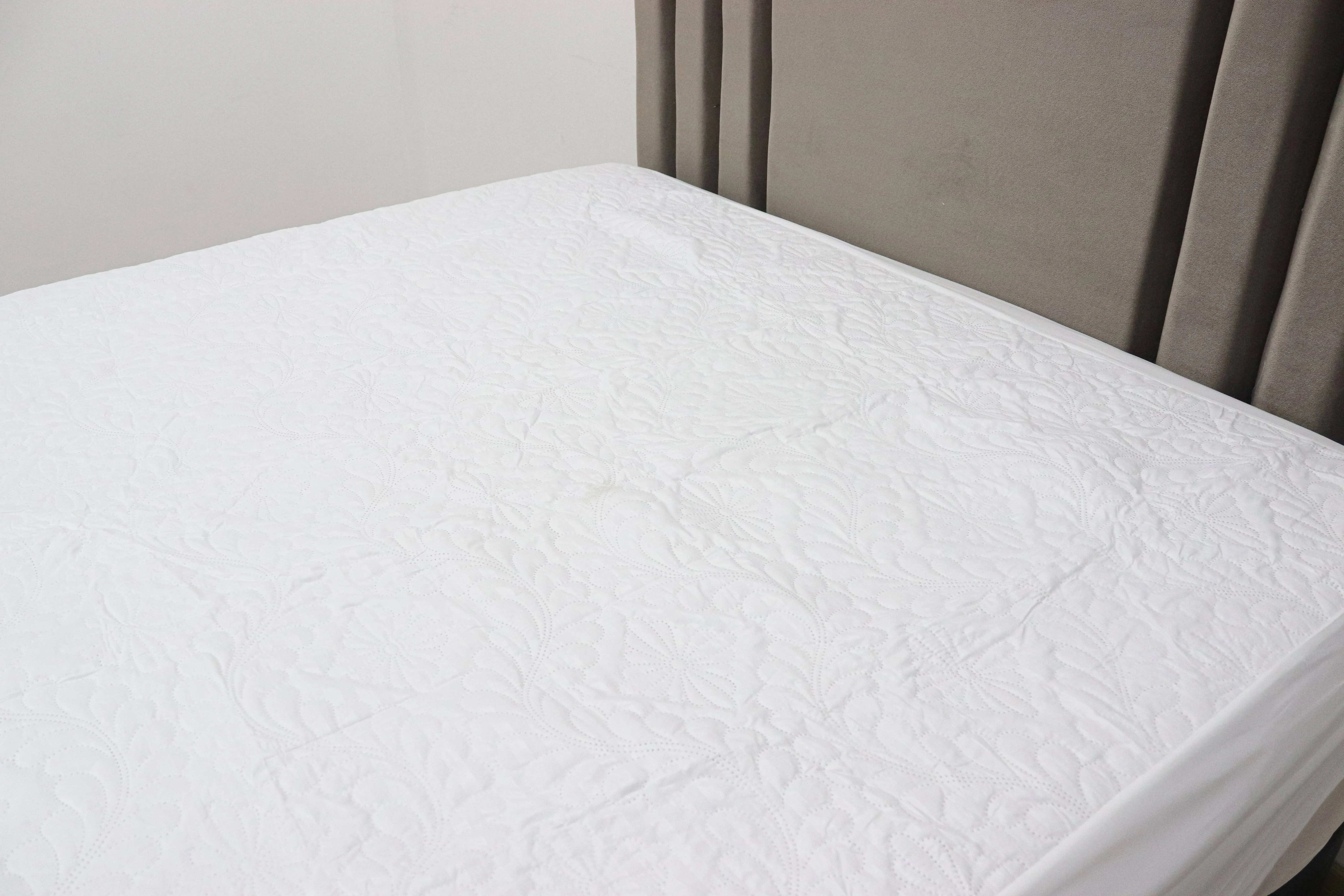 Protector de colchón en tela. sencillo - Hotelero Colombia